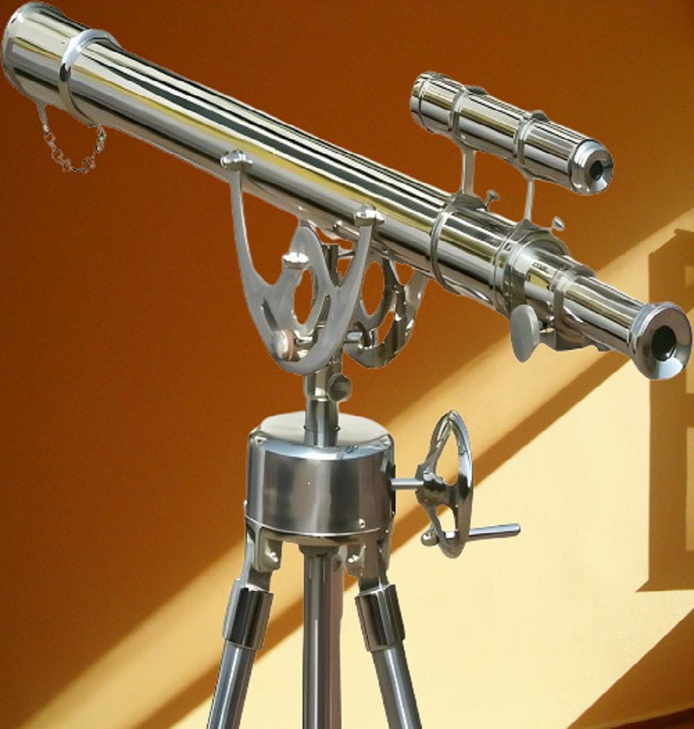 May include: A polished silver telescope with a tripod base. The telescope has a long barrel with a smaller sighting scope attached. It features decorative metalwork and a hand-operated adjustment wheel. The tripod legs are adjustable.