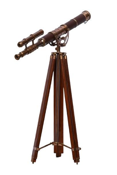 May include: A vintage-style telescope with a dark brown barrel and brass accents. It is mounted on a wooden tripod with dark brown legs. The telescope has a smaller, attached scope and is set against a white background.